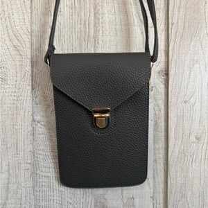 Dark Gray Crossbody Bag with Gold Clasp and Adjustable Strap